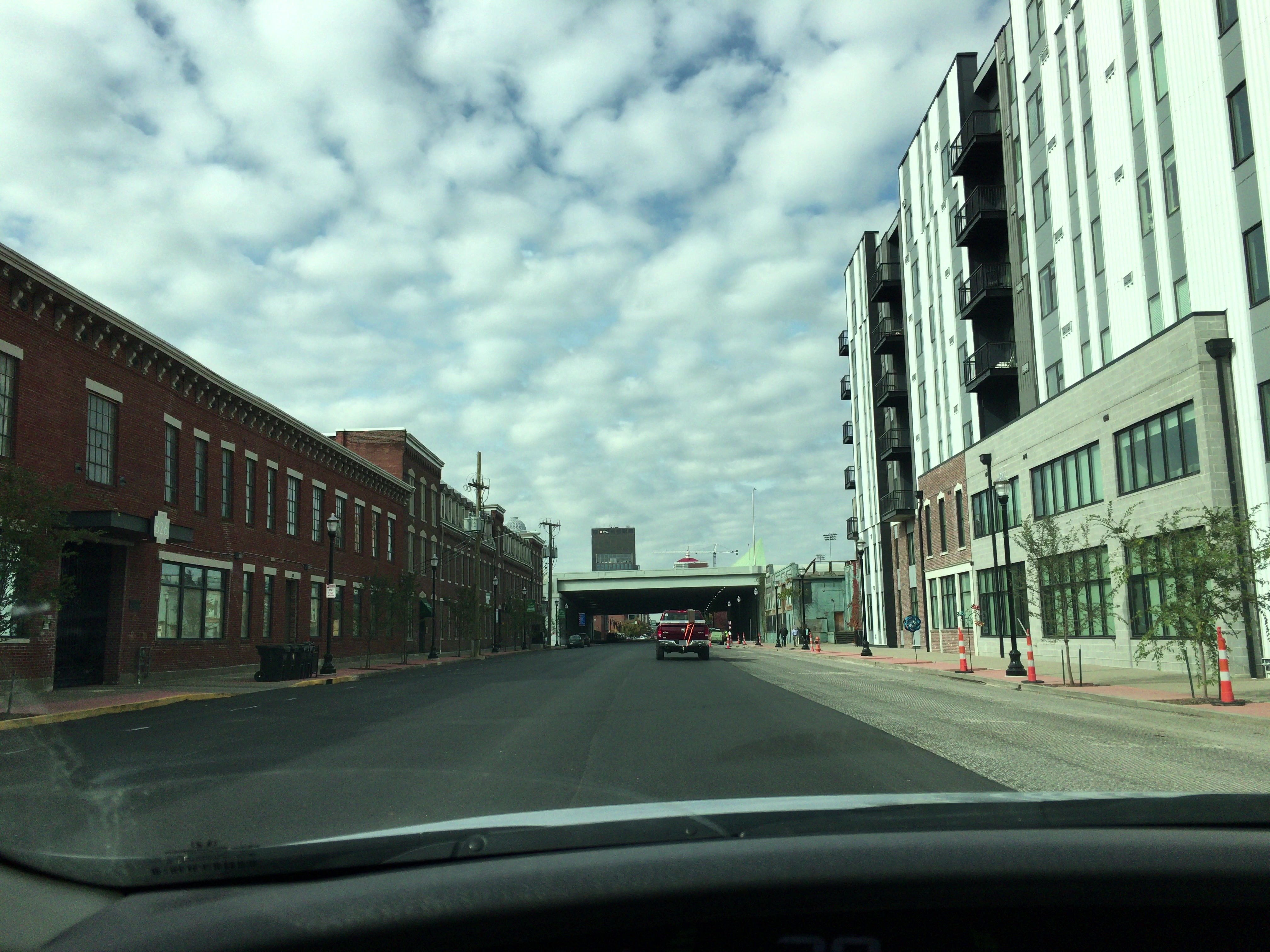 Street-level photograph of the current 310 at NuLu project site in Louisville.