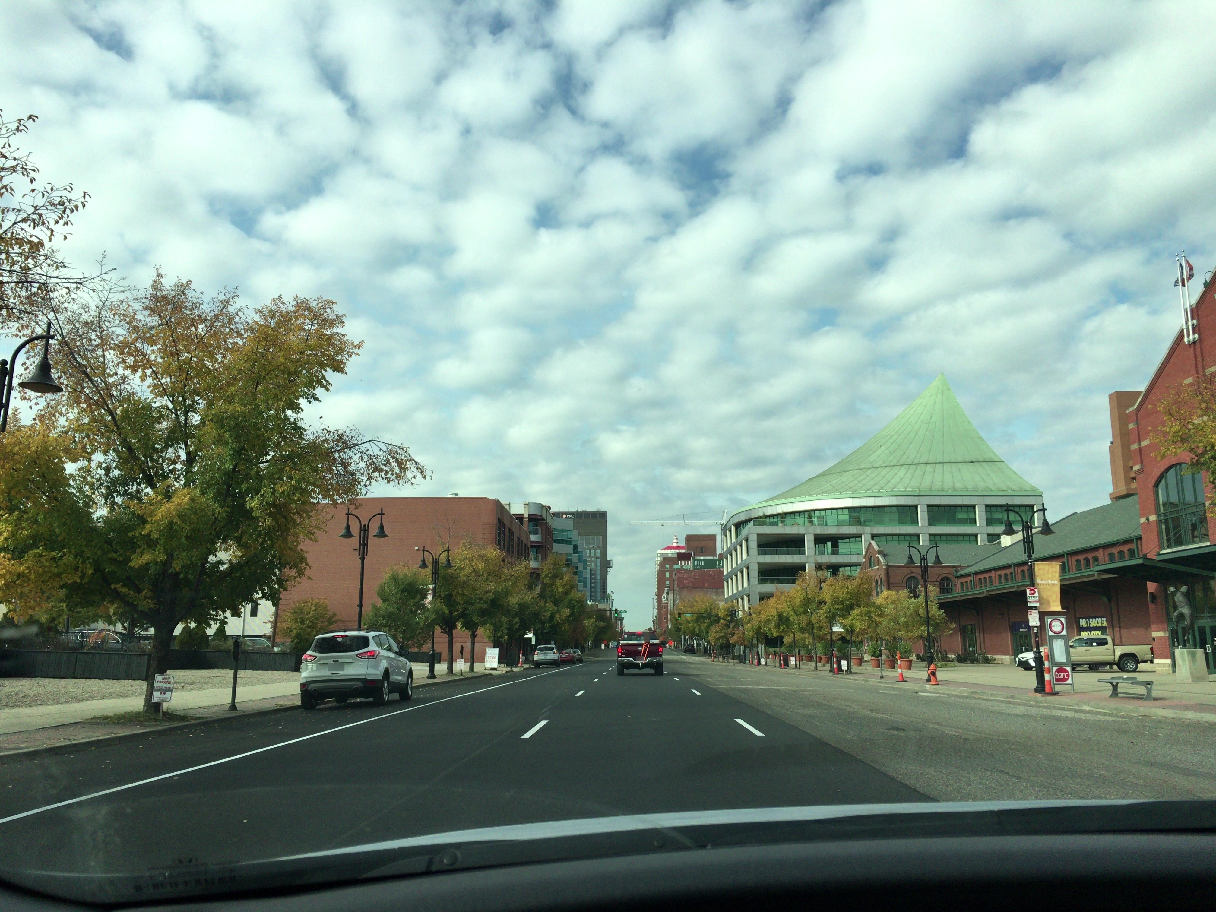 Street-level photograph of the current Tempo by Hilton at NuLu Yard project site in Louisville.